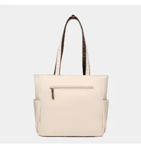Casual minimalist tote bag for women, lightweight commuter shoulder bag with zipper pocket.