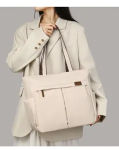 Casual beige commuter tote bag for women, versatile shoulder handbag for daily office work.