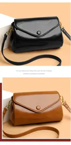 Detailed view of vintage PU leather envelope shoulder bag with elegant flap and strap.