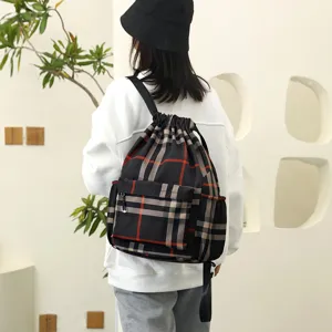 Klassischer karierter Kordelzug-Rucksack für Damen, lässige Reisetasche mit Kapazität.