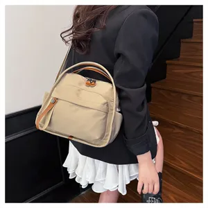 Stylish casual canvas crossbody bag for women, versatile daily shoulder handbag now.