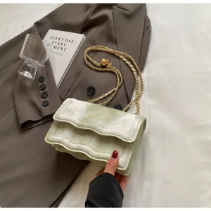 Stylish wave pattern chain crossbody bag for women, chic single shoulder bag with chic design.