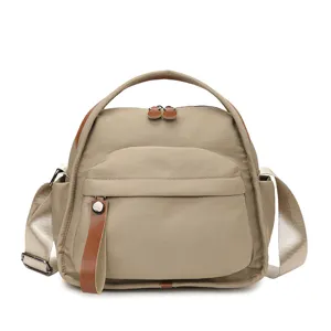 Casual minimalist canvas crossbody shoulder bag, lightweight daily commuter tote for women.