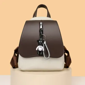 Damen Mode Kontrastfarbe Rucksack Lässiger Pendler Schulbuch Tasche Einfache PU Leder Rucksack mit Bär Anhänger