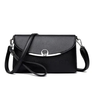 Classic black women's PU leather shoulder crossbody bag with metal clasp, elegant daily handbag.