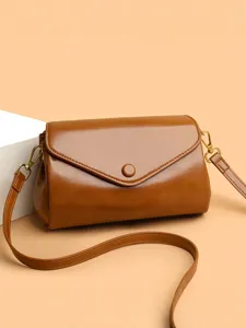 Vintage brown PU leather crossbody bag, elegant envelope flap shoulder bag for women daily commute.