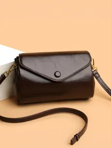 Stylish retro PU leather crossbody bag for women, elegant brown single shoulder commuting bag.