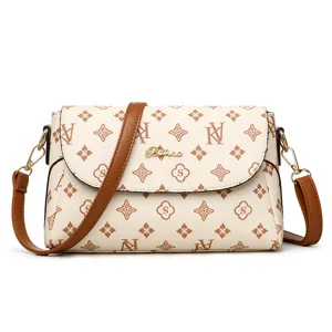 Elegant women shoulder crossbody bag, chic monogram leather handbag with brown strap, stylish daily purse.