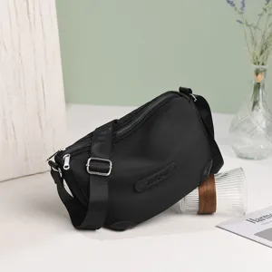 Solid color nylon crossbody bag, casual daily shoulder bag for women, versatile and chic.