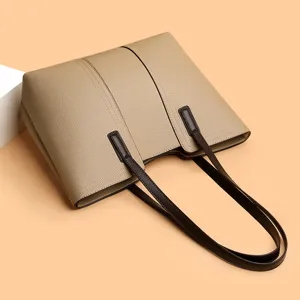 Elegant large capacity leather tote bag for women, stylish minimalist daily shoulder bag.