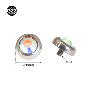 Titanium piercing top detail showing multi-facet crystal stone and M1.2 threaded screw.