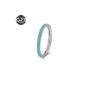 G23 titanium nose ring hoop with blue cubic zirconia gems, body piercing jewelry.