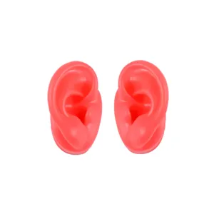 Soft silicone ear models pair for jewelry display, piercing practice, and training.