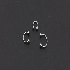 Stainless steel horseshoe piercing ring detail view, C shape barbell body jewelry.