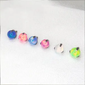 G23 titanium opal piercing top detail, colorful round jelly opal body jewelry accessory.