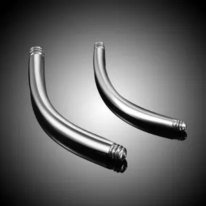 Stainless steel curved barbell piercing detail shot, smooth body with external thread ends.