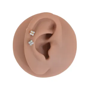 Titanium four-stone flower cartilage stud and labret piercing jewelry for daily wear style.