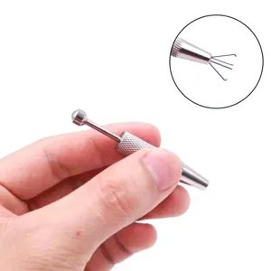 Stainless steel 4-prong diamond picker gemstone grabber tool for jewelry making and piercing.