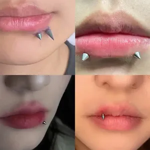 Titanium lip piercing spike labret jewelry detail view showing comfortable curved wear fit.