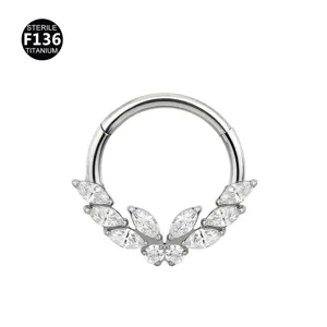 Titanium hinged segment ring with sparkling cubic zirconia wing charm details.