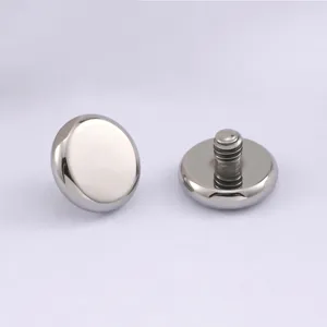 Close-up detail of titanium F136 flat top external threaded body piercing stud accessory.