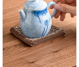 Hand-painted blue lotus ceramic teapot detail shot, elegant Chinese kung fu tea set piece.
