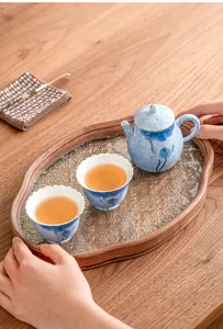 Hand-painted blue lotus ceramic kung fu tea set with one pot and two cups, elegant home use.