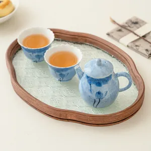 Hand-painted blue lotus ceramic kung fu tea set with one teapot and two tea cups for home.