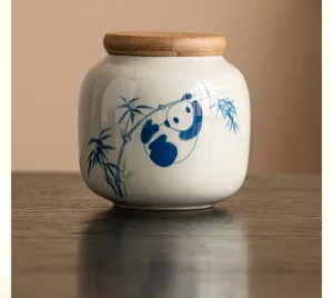 Boîte à thé en céramique peinte à la main avec couvercle en bambou, détail panda.