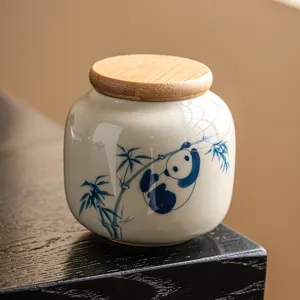 Pot à thé en céramique peint à la main avec design panda bambou et couvercle en bois