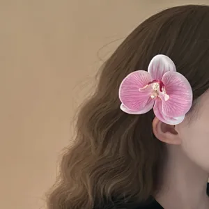 Orchidee Blumen Haarklammer Nahaufnahme, süßes Perlen Entenschnabel Haaraccessoire