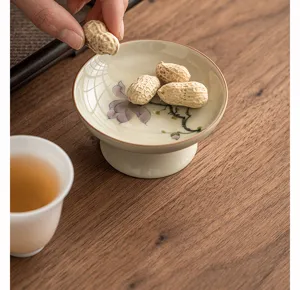 Soporte de tapa de té de cerámica pintada a mano, accesorio vintage y plato para aperitivos.