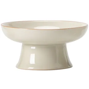 Soporte de tapa de tetera de cerámica de pie alto y mini frutero expositor para té.