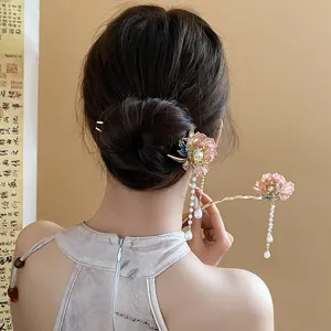 Detailed view of the elegant Chinese style hair stick with pink floral and pearl tassels.