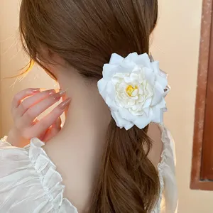 Elegant white flower hair claw clip for women, sweet floral duckbill clip hair accessory.