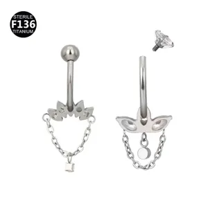 F136 titanium belly button ring body piercing with chain and marquise gemstone detail view.