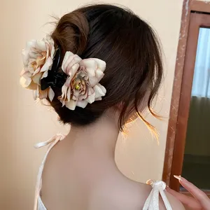 Sweet floral hair claw clip with dry rose design for women styling and elegant daily wear.