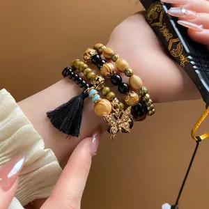Bohemian multi-layer wooden bead bracelet with tassel and butterfly charm stylish jewelry