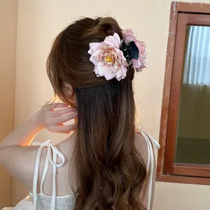 Sweet rose flower hair claw clip for women, elegant hair styling accessory for daily wear.