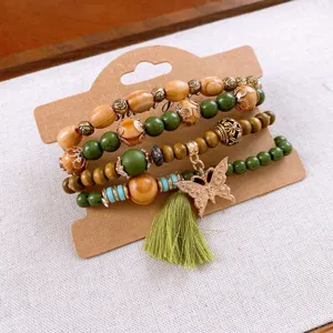 Bohemian multi-layer wooden bead bracelet with butterfly tassel charm for women trendy jewelry.