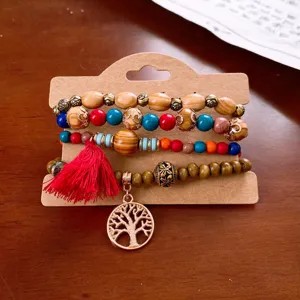 Bohemian multi-layer wooden bead bracelet detail, fashion vintage jewelry accessory with tassel.