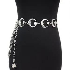 Silver moon star waist chain detail shot, punk style metal body chain accessory for women.