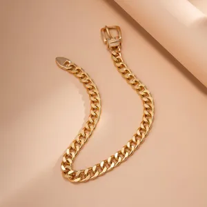 Minimalist gold-colored metal chain accessory, stylish and versatile cubic link design for women.