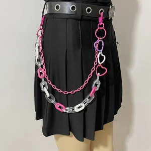 Close-up detail shot of multi-layer hip-hop acrylic chain waist belt with cute heart charms.