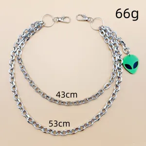 Punk multi-layer metal pants chain with cool green alien pendant for hip-hop streetwear.