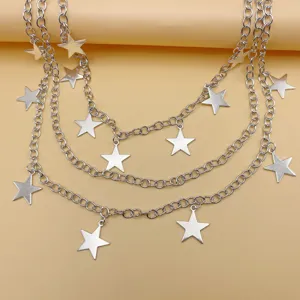 Detailed view of the multi-layer silver metal pants chain featuring stylish star charms.