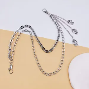 Punk style multi-layer metal pants chain with skull pendants, cool silver waist chain accessory for men.