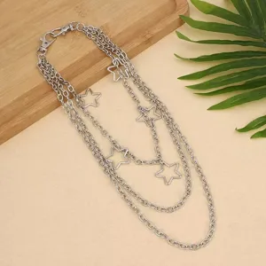 Detail view of punk style multi-layer metal star waist chain and pants chain accessory.