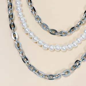 Punk vintage multi-layer chain detail shot, metal and faux pearl waist pants chain decoration.