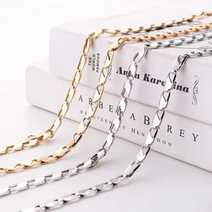 Stylish metal chain waist belt detailed view, showcasing unique geometric links in gold silver.